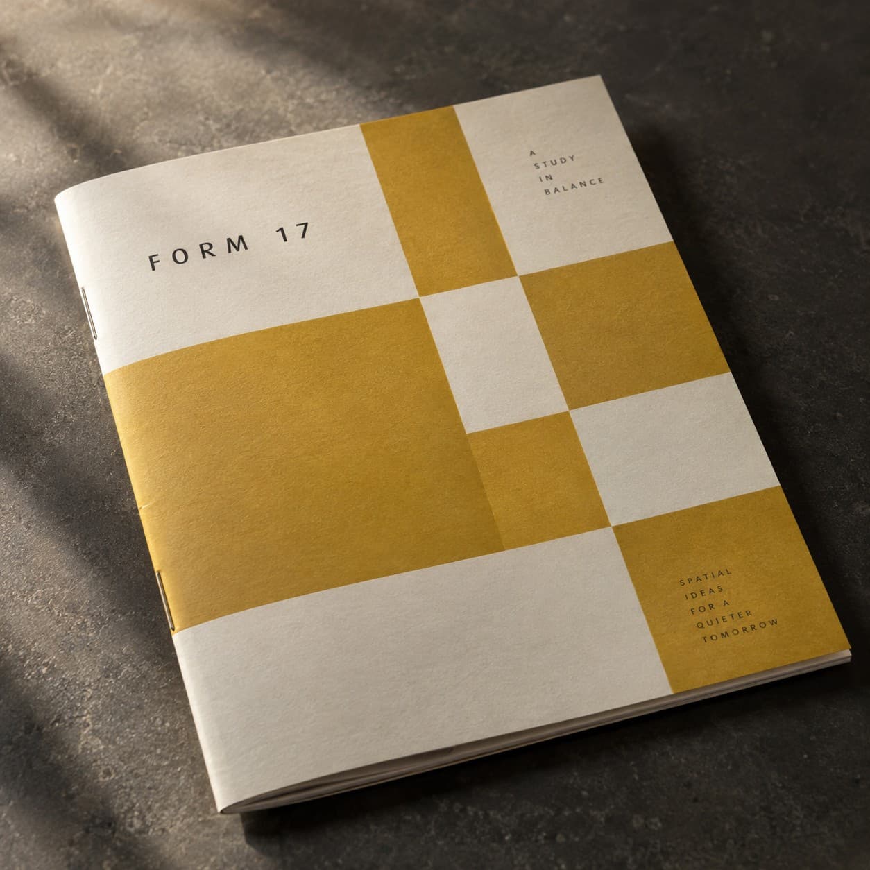 Stapled Booklet — mustard modular checkerboard composition