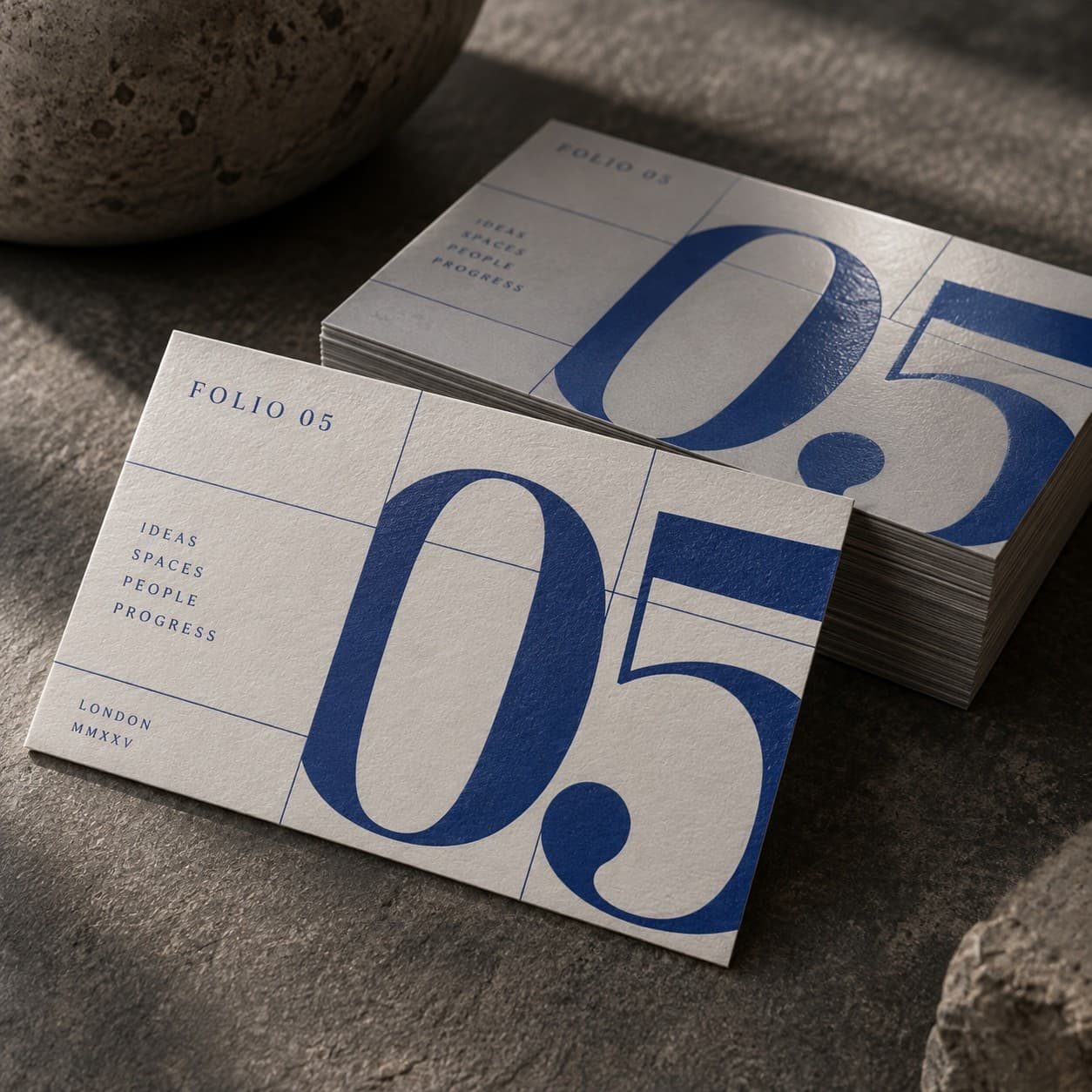 Laminated Business Cards — cobalt typographic grid with oversized numerals