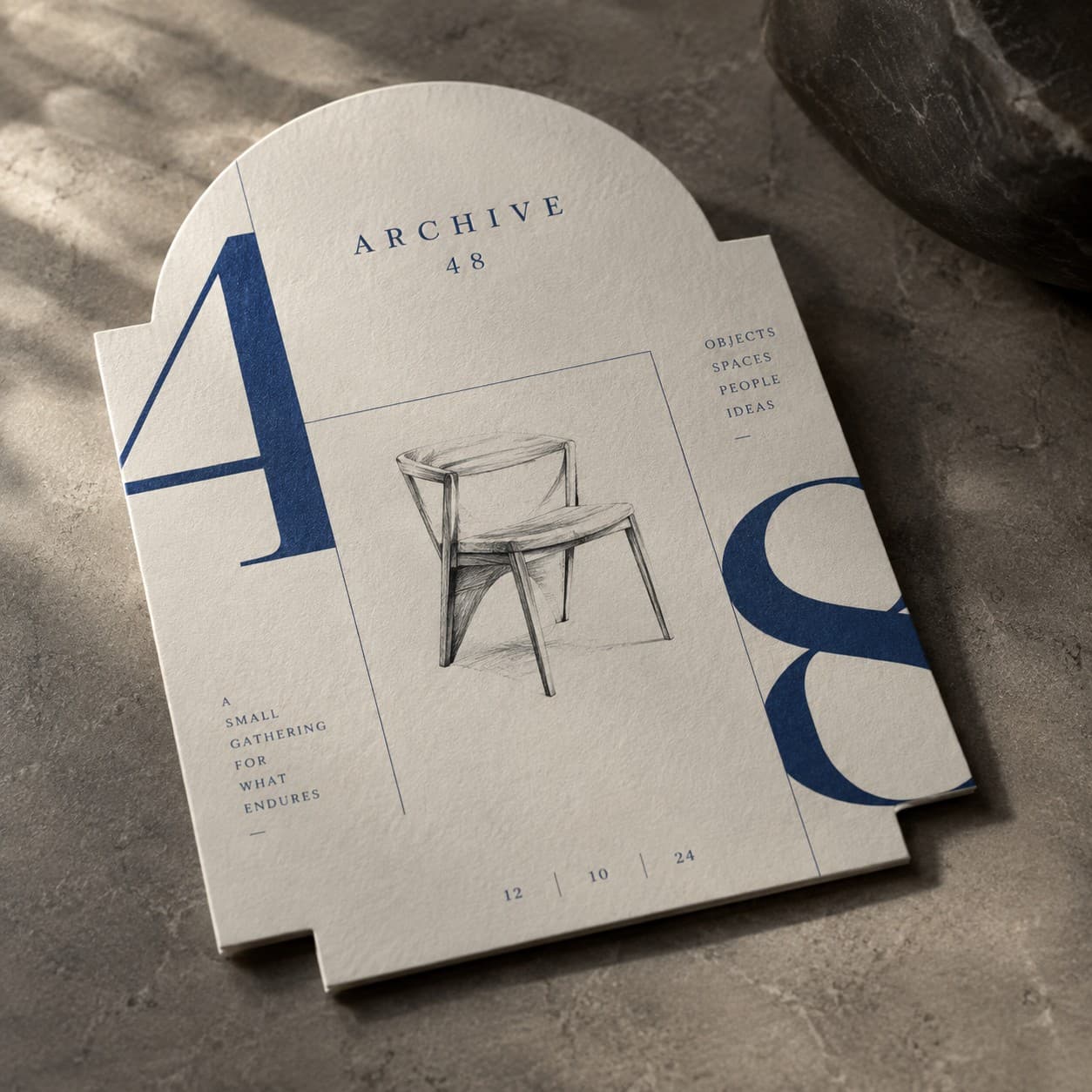 Custom Shape Invitations — cobalt typographic grid with oversized numerals, with a chair
