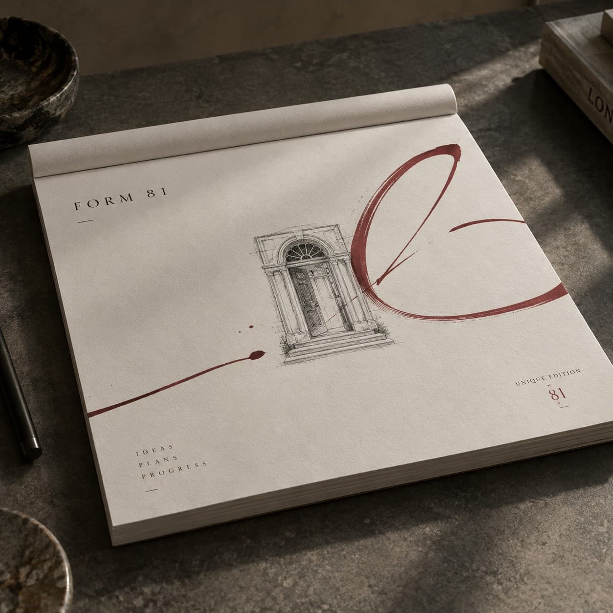 Desk Pads — deep red expressive calligraphic line, with a doorway