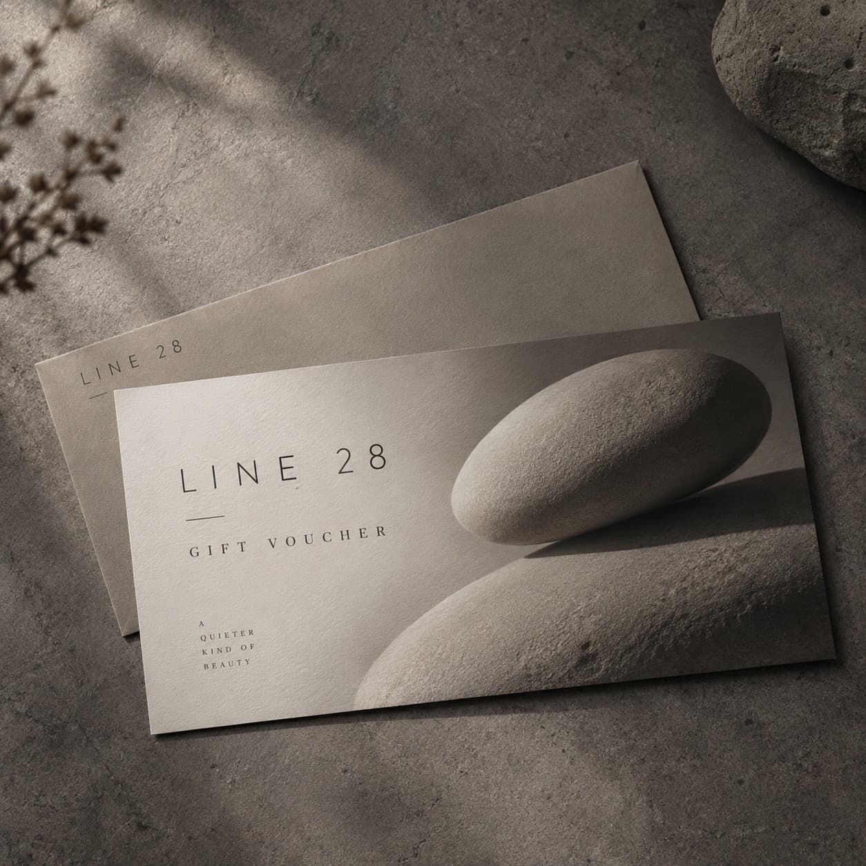 Gift Vouchers — warm grey sculptural pebble photograph