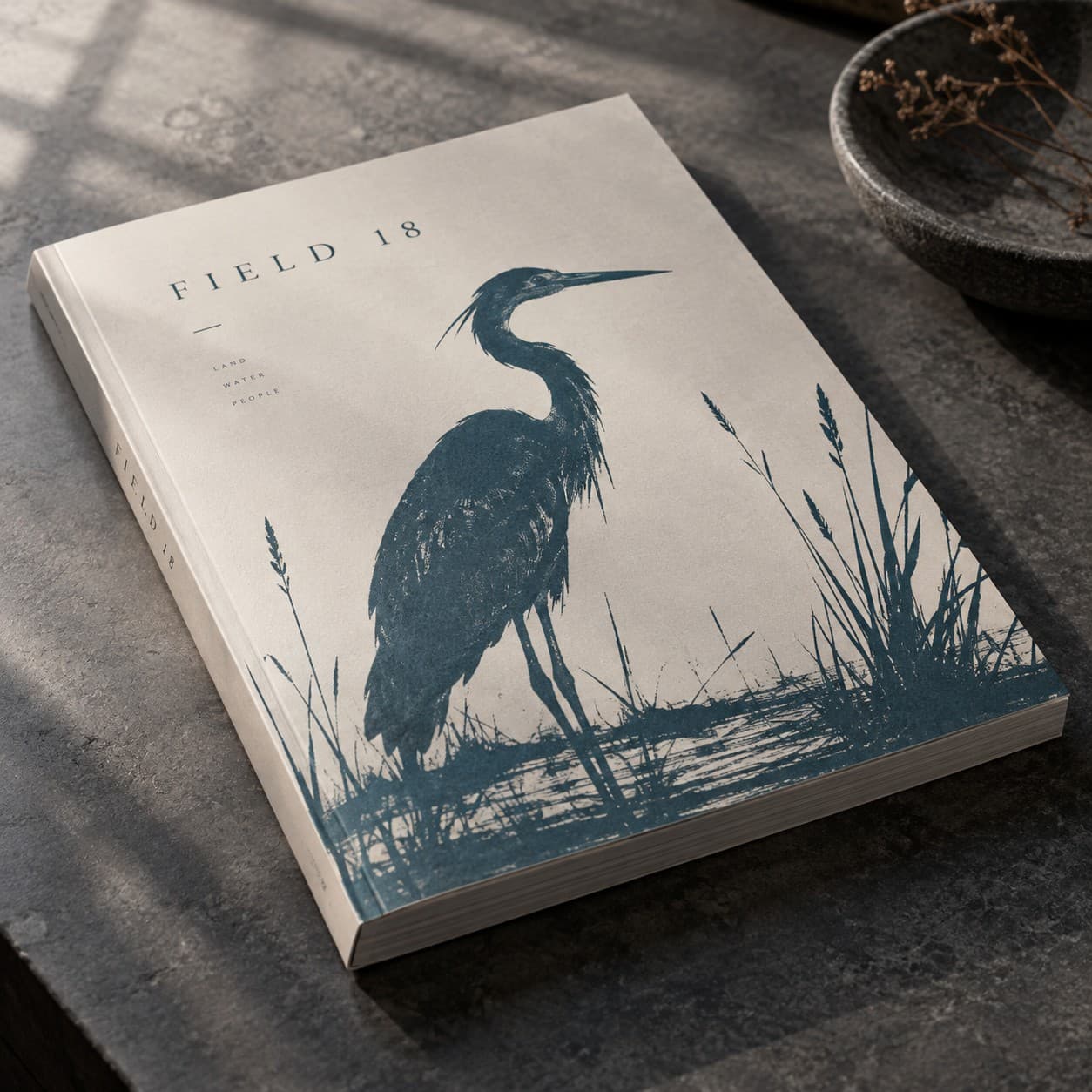 Perfect-Bound Brochure — petrol blue heron silhouette